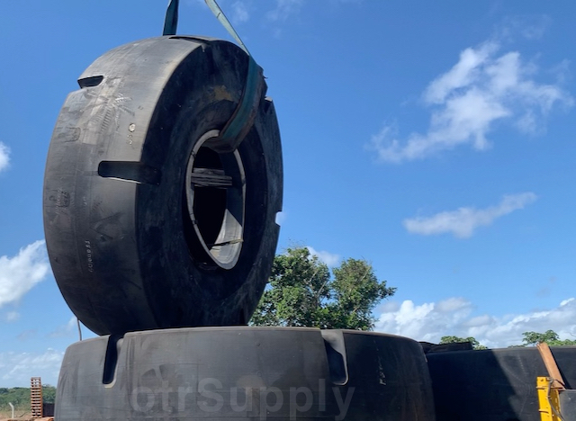 otrSupply - crane lifted goodyear drl d/l-4/15c 52/80-57 wheel loader tire to stuff a flat-rack 20 feet container